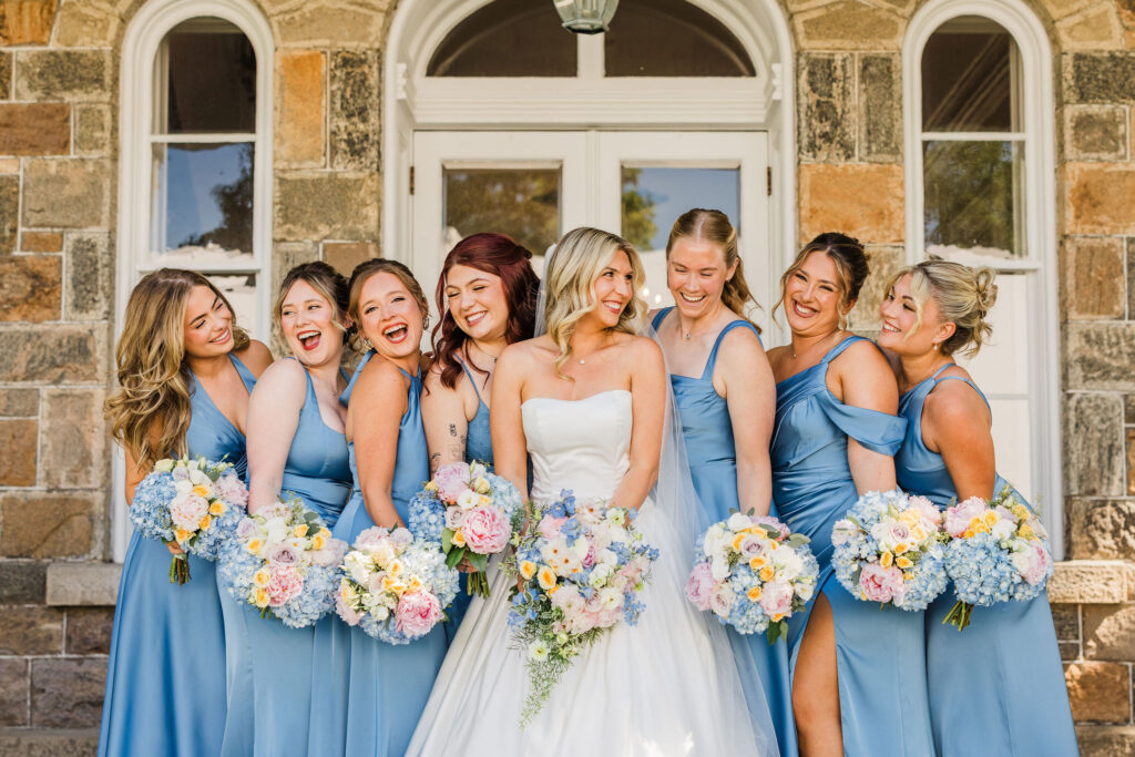 Bridal party poses at Brecknock Hall wedding
